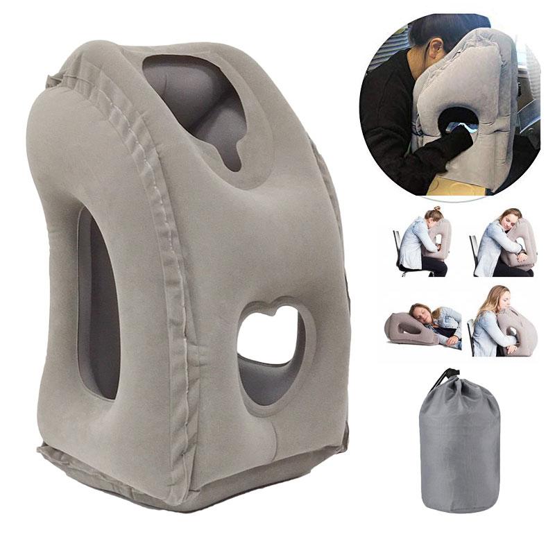 Grey inflatable travel pillow for airplane, train and office rest