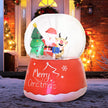 5.5ft Inflatable Christmas Snow Globe illuminated outside a home