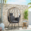Standing rattan egg chair – image 8