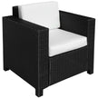 Black rattan garden armchair with thick cream white cushions