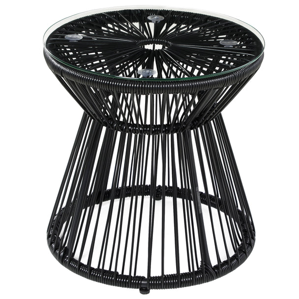 Black round rattan drum side table with hollow stringed design and glass top