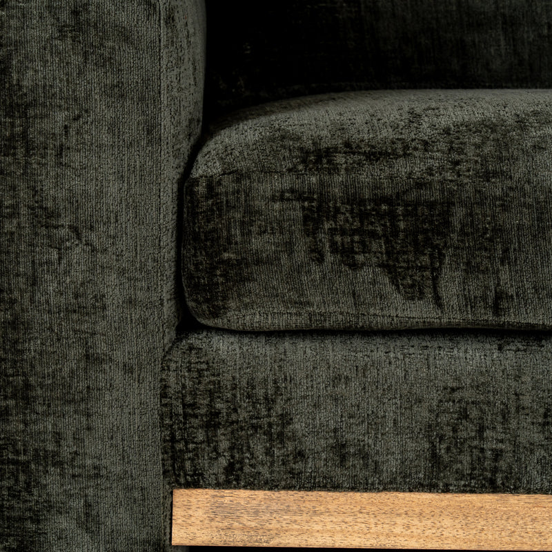 seat cushion and wooden base trim close-up