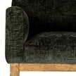 Close-up of the textured green fabric on the arm