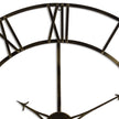 Close-up of the antique brass frame and Roman numerals