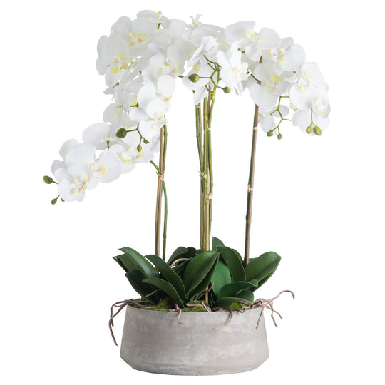 large white artificial orchid in a grey stone-effect pot