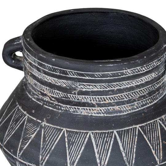 Inside rim and handles of the large etched pot