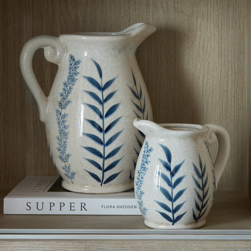 Blue Flora jug vase on a shelf with a smaller jug sold separately