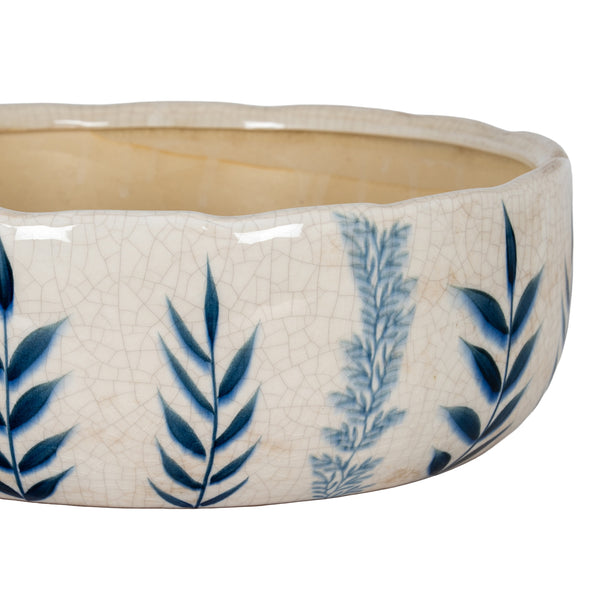 Close-up of the blue leaf pattern and crackle glaze