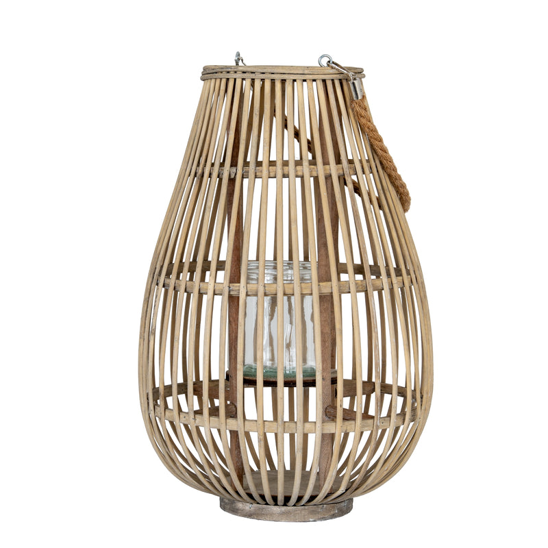 Large ellipse wicker lantern with rope handle on white