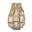 Large ellipse wicker lantern with a candle in its glass holder