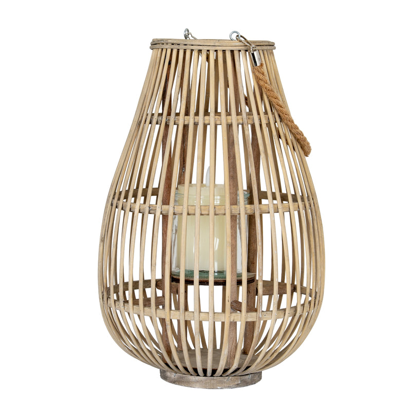 Large ellipse wicker lantern with a candle in its glass holder