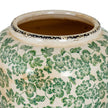 Inside the opening of the Green Clover vase