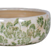 Close-up of the green clover pattern and crackle glaze