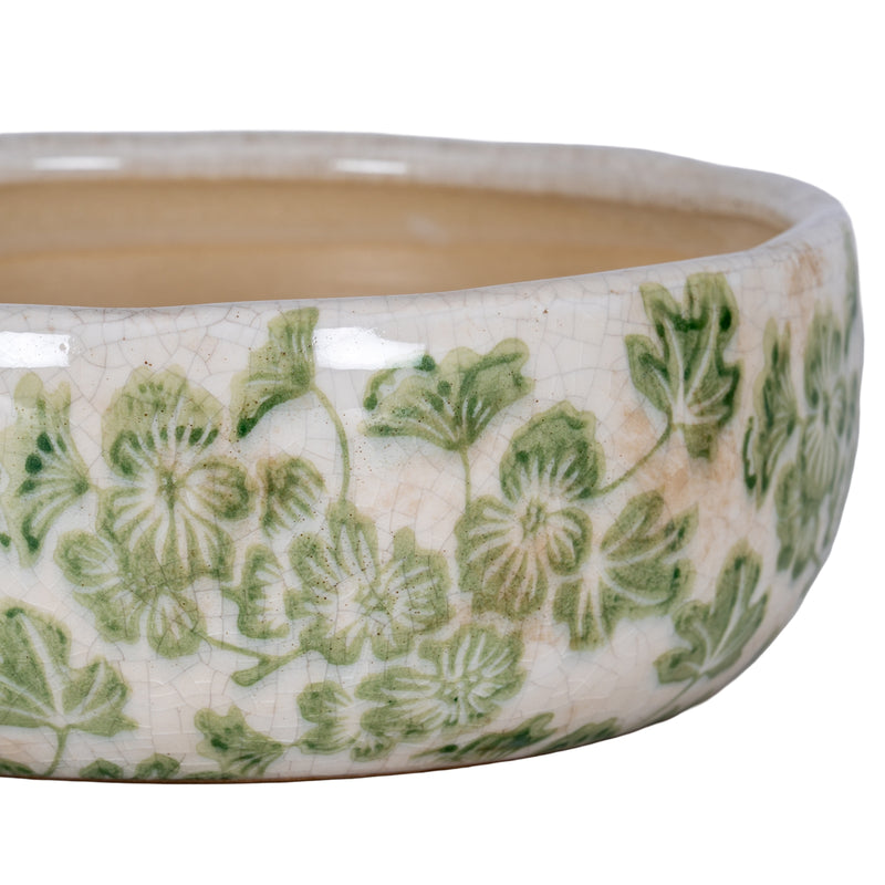 Close-up of the green clover pattern and crackle glaze