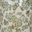 Close-up of the green clover and flower pattern
