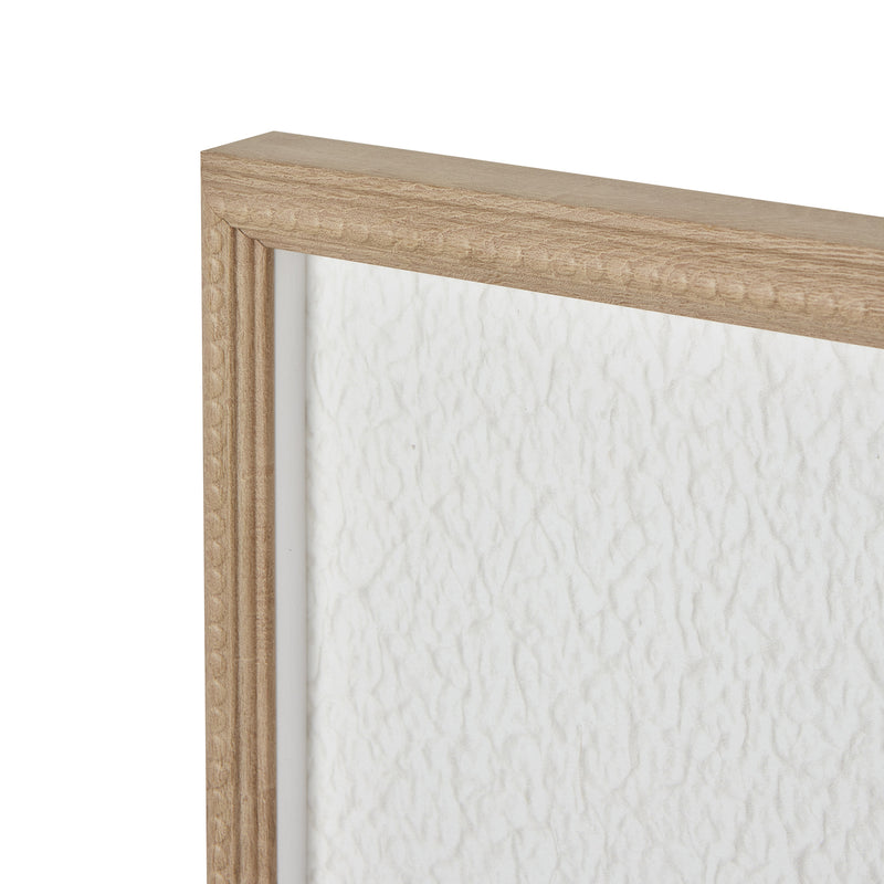 Close-up of the beaded wood-tone frame corner