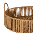 Close-up of a loop handle and the woven wicker sides