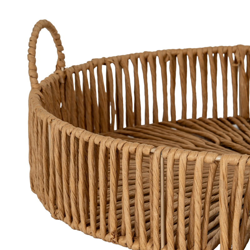 Close-up of a loop handle and the woven wicker sides