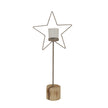 Rustic wire star candle holder with glass votive on a wood log stand, full view