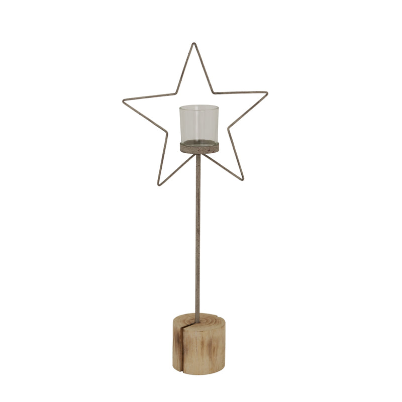Rustic wire star candle holder with glass votive on a wood log stand, full view