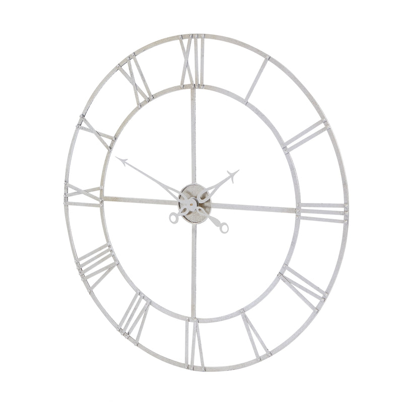 Silver skeleton wall clock seen from an angle