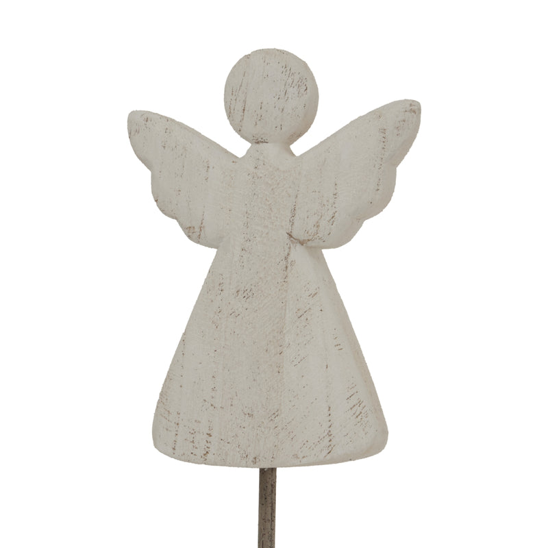 Close-up of the whitewashed angel and wings