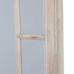 Close-up of a pane divider on the washed wood frame