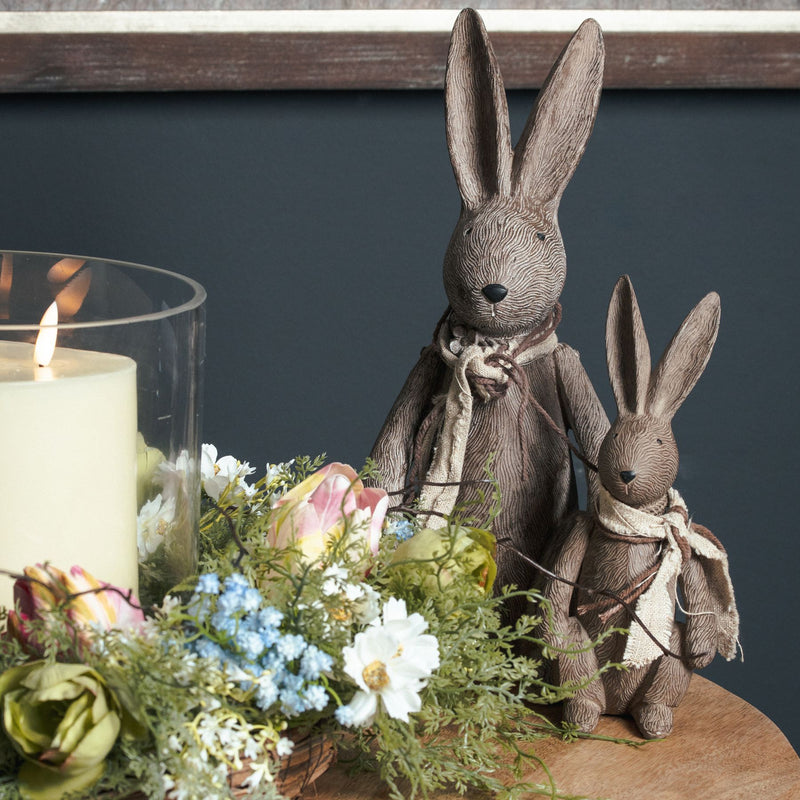 Bunny rabbit with candle and flowers, shown with a smaller rabbit sold separately