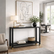 Lennox console in a hallway with a lamp and plant