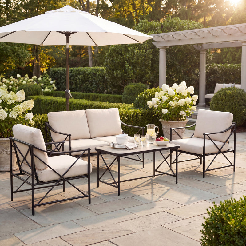 Madison lounge set under a parasol on a garden terrace