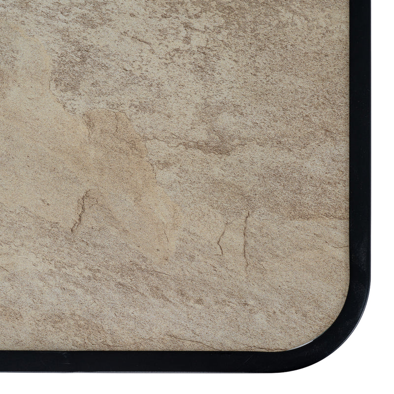 close-up of the stone-look table top and black edge