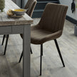 Malmo coffee chairs at a wooden dining table