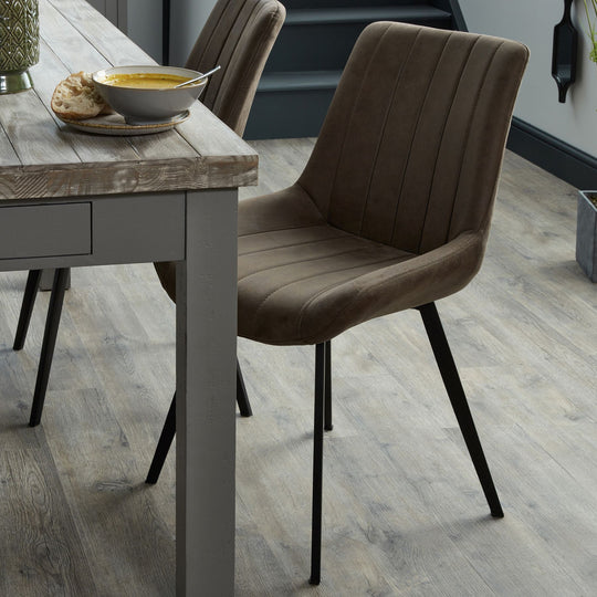 Malmo coffee chairs at a wooden dining table
