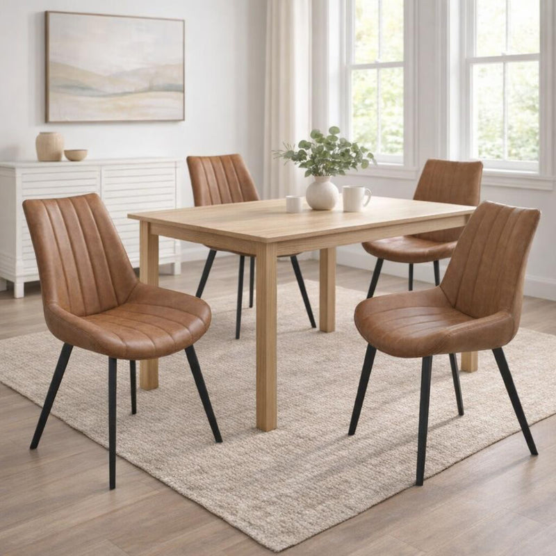 Malmo Tan Faux Leather Dining Chair with Black Legs, four tan dining chairs around a wooden dining table