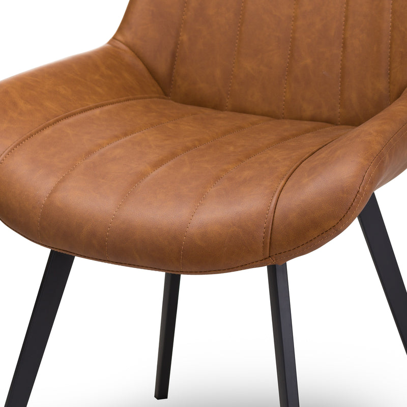 Malmo Tan Faux Leather Dining Chair with Black Legs, close-up of the stitched faux leather seat