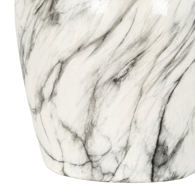Close-up of the white and grey marble-effect glaze