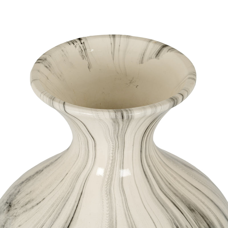 Looking into the flared neck of the marble effect vase