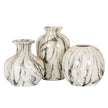 Globe vase shown with two other marble vases, sold separately