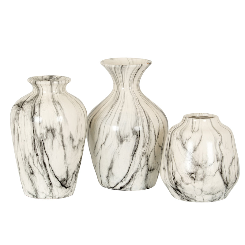 Chours vase grouped with other marble vases, sold separately