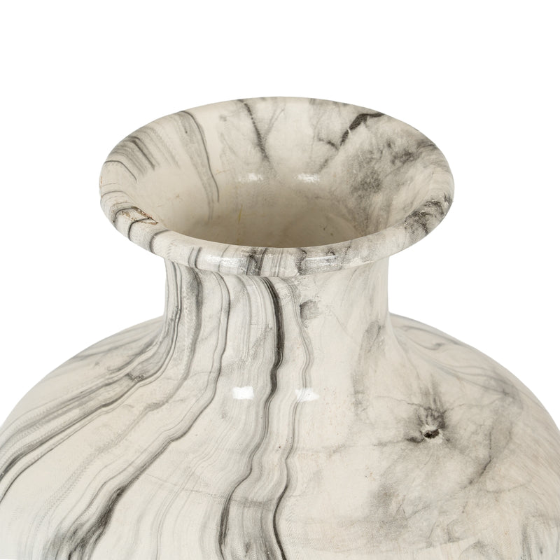 Looking into the flared neck of the squat marble vase