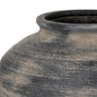 Close-up of the weathered charcoal and sand glaze