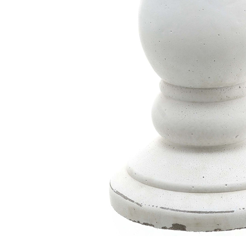 Close-up of the worn edges on the candle holder base