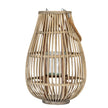 Medium ellipse wicker lantern with rope handle on white