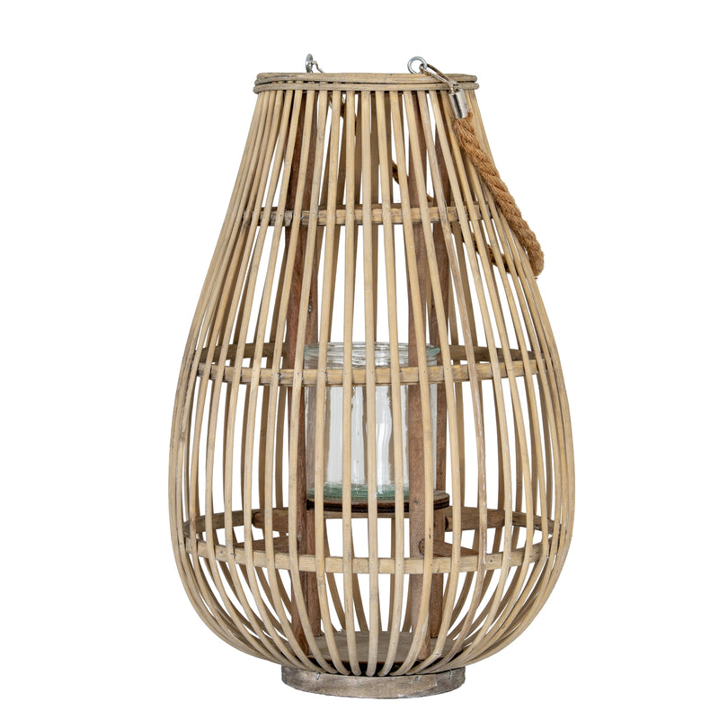 Medium ellipse wicker lantern with rope handle on white