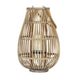 Medium ellipse wicker lantern with a candle in its glass holder