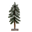 Medium snowy pine Christmas tree on a wooden stand
