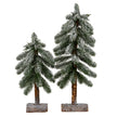Medium snowy pine tree beside a smaller size, sold separately