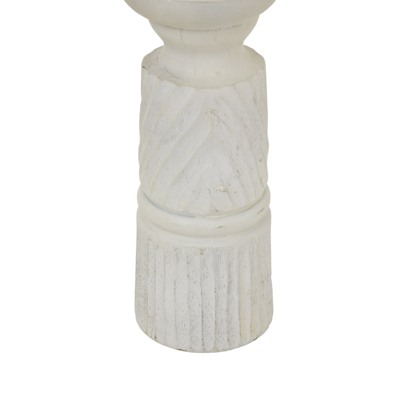 Close-up of the carved column and fluted base