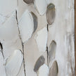 Close-up of the raised paint texture on the leaves