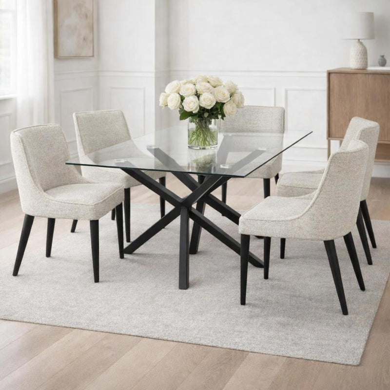 Monza glass table with cream chairs in a bright dining room